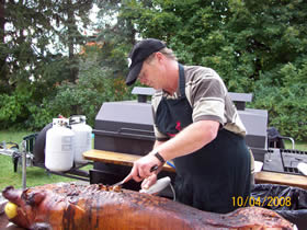 Terry carving a pig