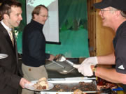 Terry serving guests